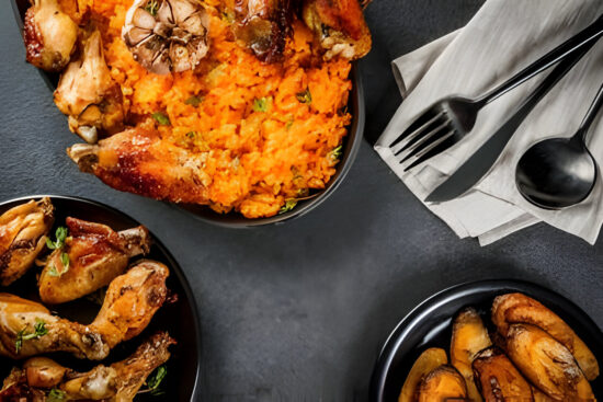 jollof-rice-in-black-plate-with-chicken-and-plantain-protein-rich-food